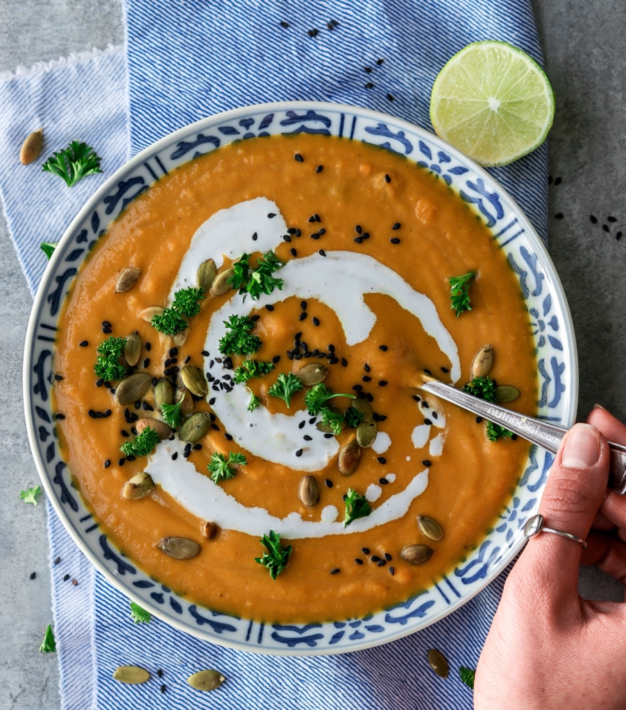 Sweet Potato Ginger Soup #Nutriholist This creamy delicious soup is the ultimate winter comfort food. Very easy to make with a handful of wholesome ingredients. #dairyfree #vegan #glutenfree #grainfree #paleo #healthy #recipe