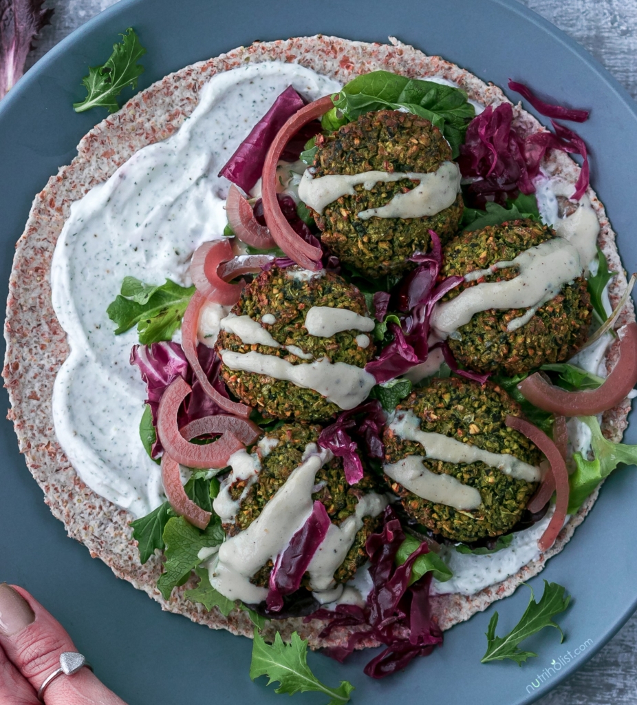 Baked Spinach Falafel #Vegan #Vegetarian #Glutenfree #Grainfree #Dairyfree #Soyfree These baked green falafels are loaded with veggies and so crispy without any frying. Prep time is less than 30 mins and they freeze well also! #Nutriholist