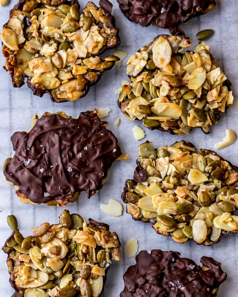 Crunchy Almond Seed Chocolate Cookies - Top view on a parchment paper lined cooling rack